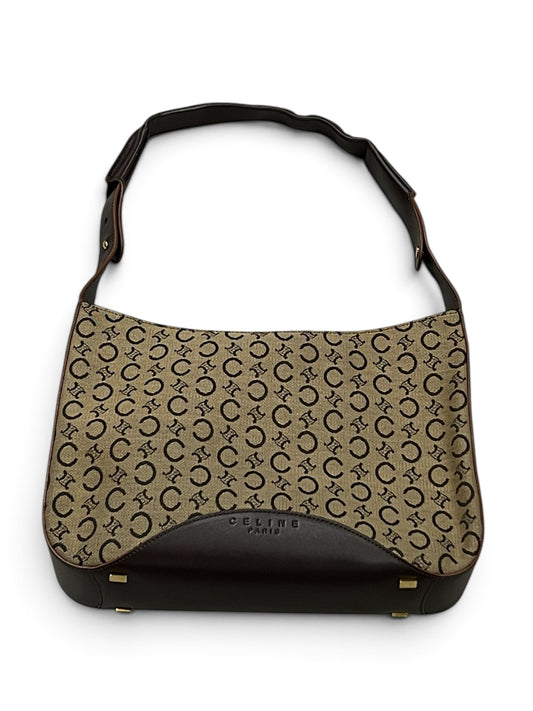 Round Retail vintage Celine Macadam canvas shoulder bag in brown with iconic monogram pattern and leather trim